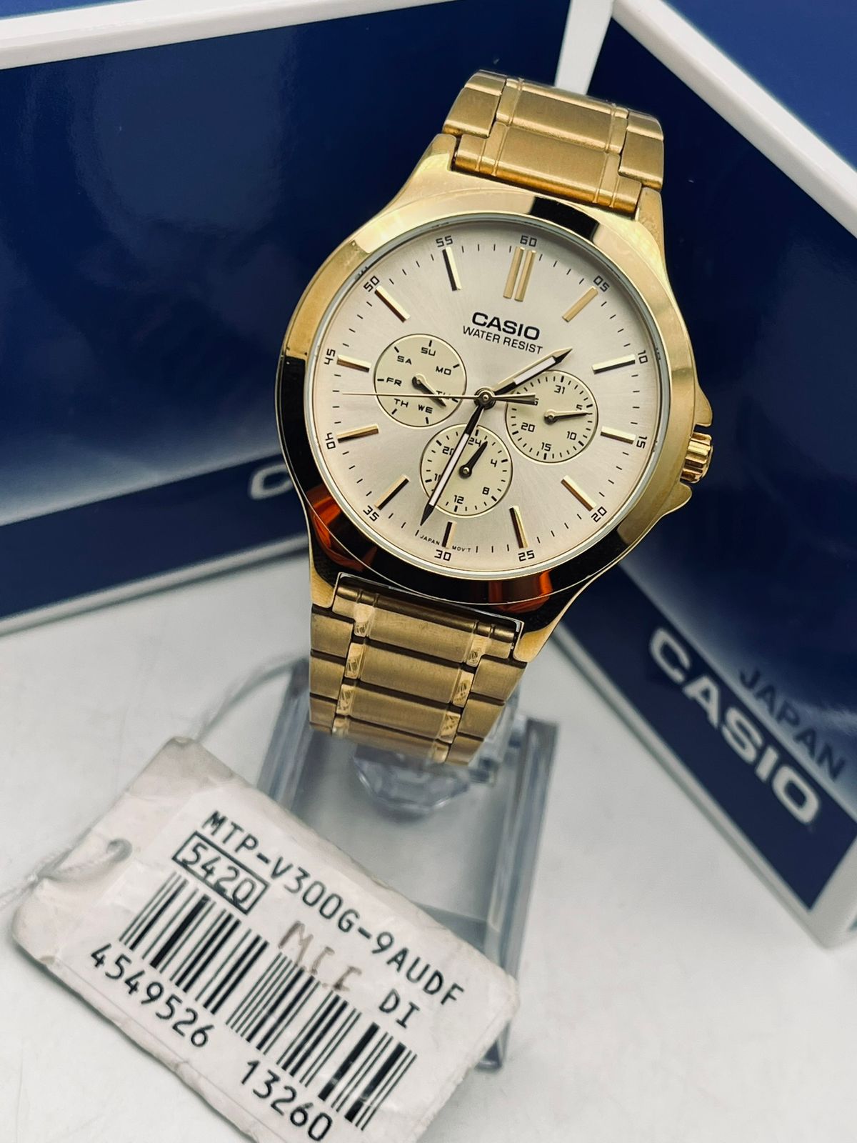 Reloj Casio Metálico Dorado Fondo Beige Mtp-v300g-9audf