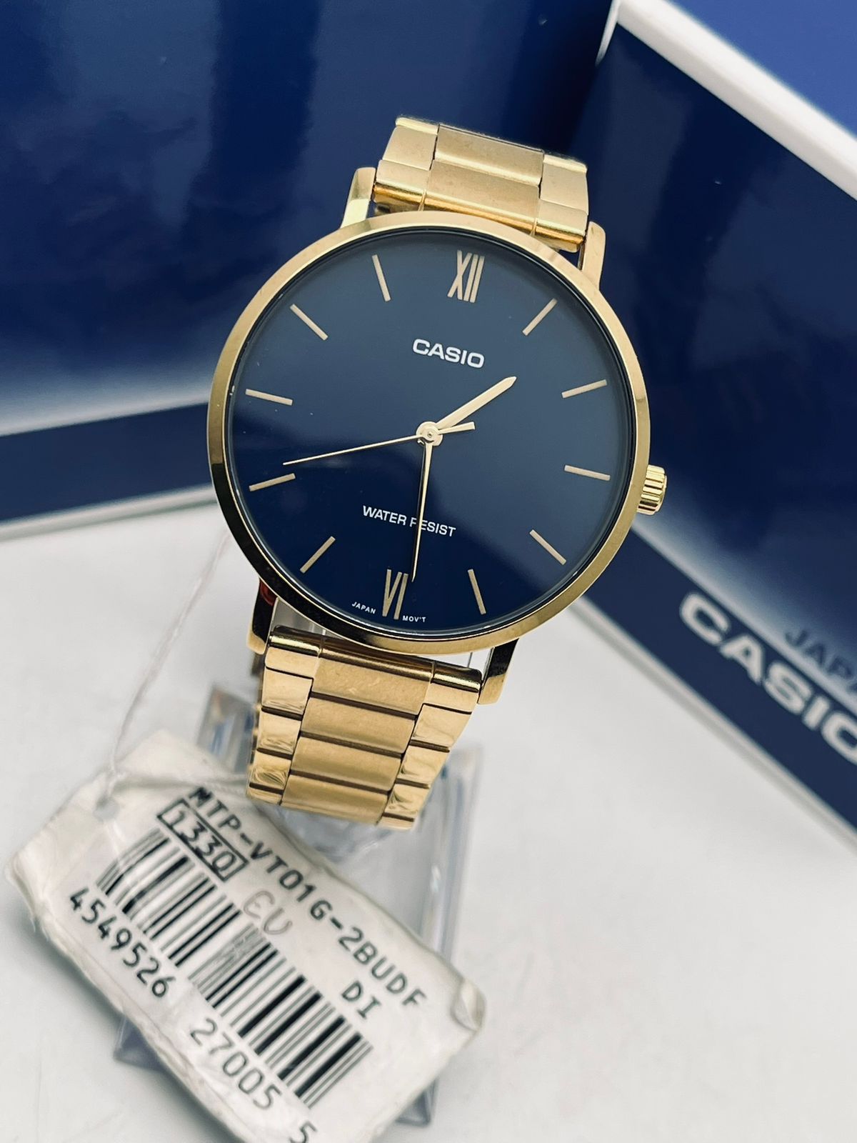 Reloj Casio Acerado Clásico Dorado fondo Azul Mtp-vt01g-2budf